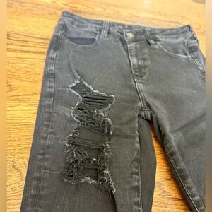 American Eagle women’s black ripped skinny jeans. Next level stretch. Size 10